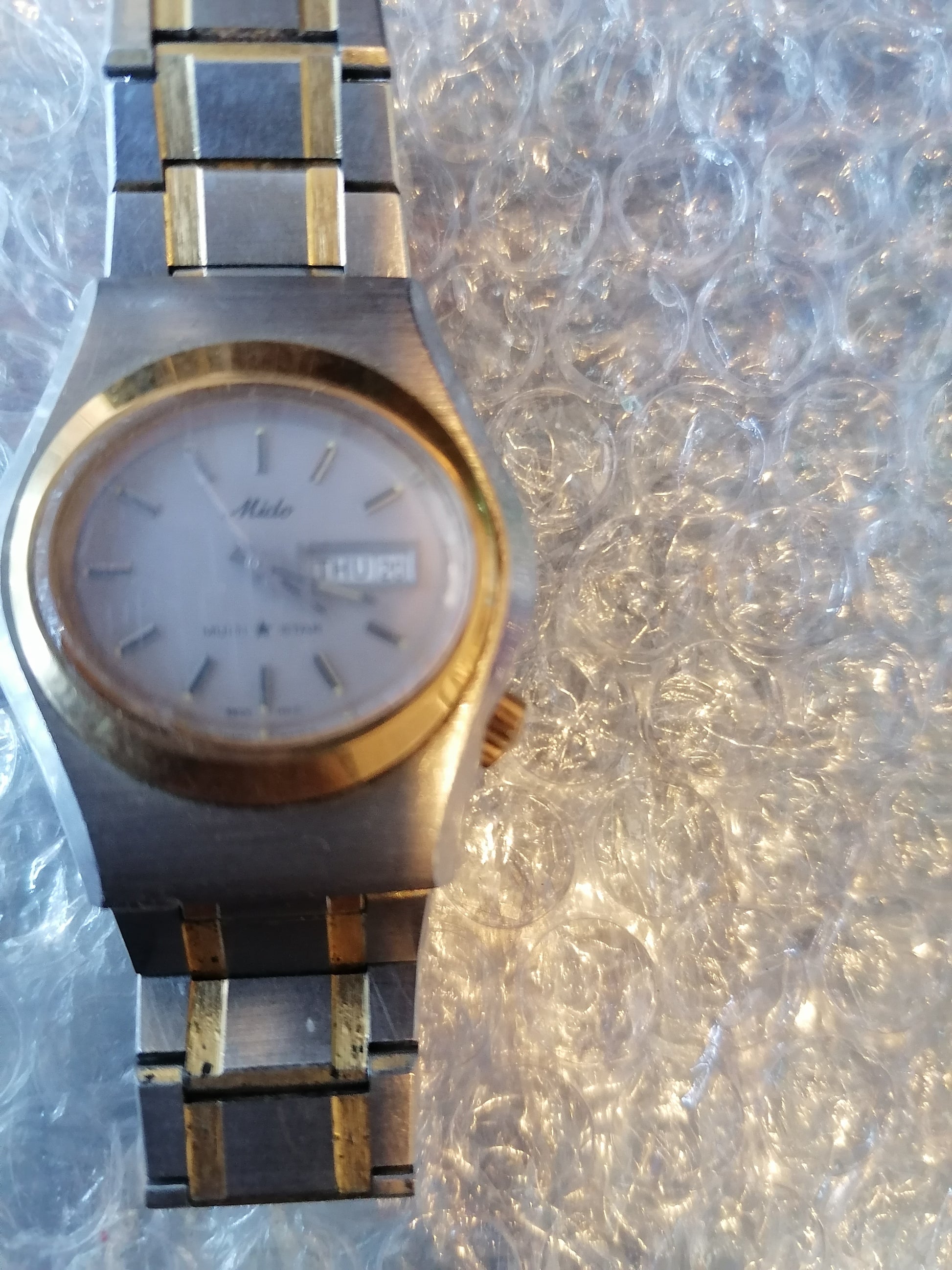 El Reloj Automático Mido Multi Estrella Día y Fecha Dos Tonos 38mm 2603-4 - Antiques Bazaar Ensenada